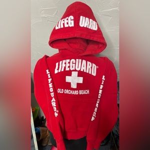 Red YL lifeguard sweatshirt from Old Orchard Beach Maine.